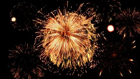 Bright colorful fireworks exploding in the dark night sky during a festive Video stock 341907909