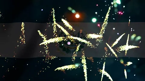 Bright colorful fireworks exploding in front of the national flag of El Sal.. Stock-Footage 343690271