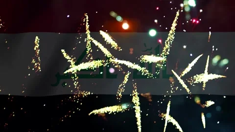 Bright colorful fireworks exploding in front of the national flag of iraq Video stock 343690282