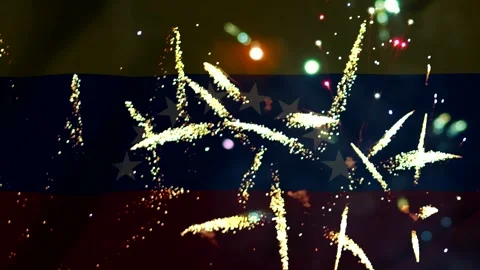 Bright colorful fireworks exploding in front of the national flag of venezu.. Stock Footage 343690294