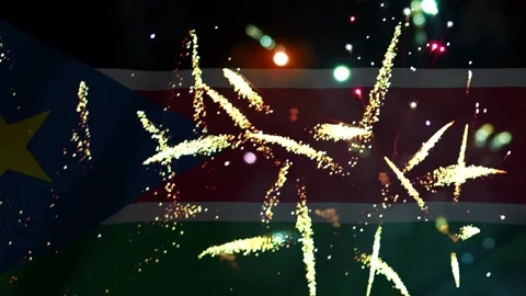 Bright colorful fireworks exploding in front of the waving flag of South Su.. Vídeo Stock 343690326