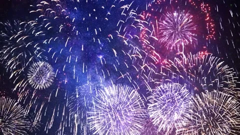 Bright Colorful Fireworks Exploding in the Night Sky Creating a Festive and Stock Footage 338332090