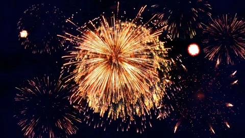 Bright colorful fireworks exploding in the night sky for celebration and Video stock 341907925