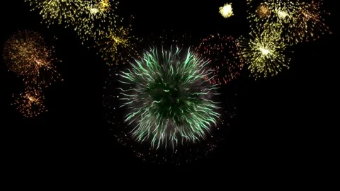 Bright colorful fireworks exploding in the night sky for celebration and Vídeo Stock 341907991