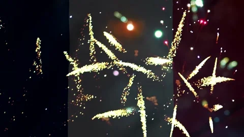 Bright colorful fireworks exploding in the night sky over the flag of franc.. Vídeos de archivo 343690380