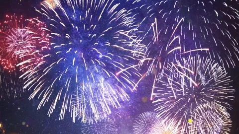 Bright colorful fireworks exploding in the night sky during a festive Stock Footage 345831992