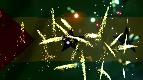 Bright colorful fireworks exploding over the national flag of Grenada celeb.. Video stock 343690492