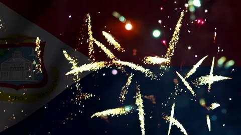 Bright colorful fireworks exploding over the national flag of Saint Martin .. Video stock 343690518