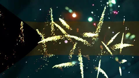 Bright colorful fireworks exploding over the national flag of the Bahamas c.. Stock Footage 343690526