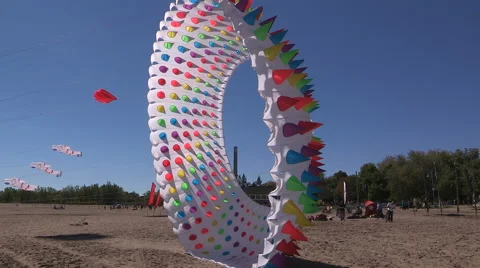 Bright colorful kites on the beach Stock Footage