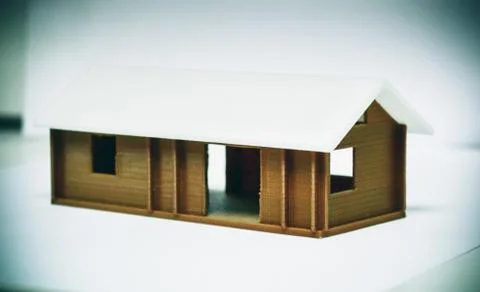 Bright colorful object printed by 3d printer. White brown house. Foto stock