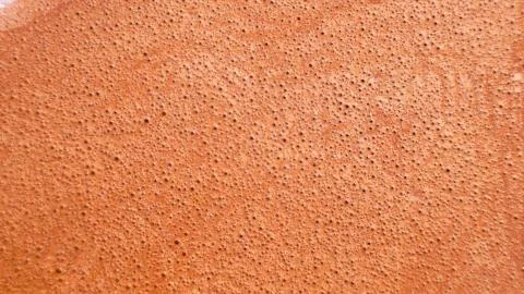 Bright colorful orange bubbles on the surface of the water. Abstract paint bu イラスト素材