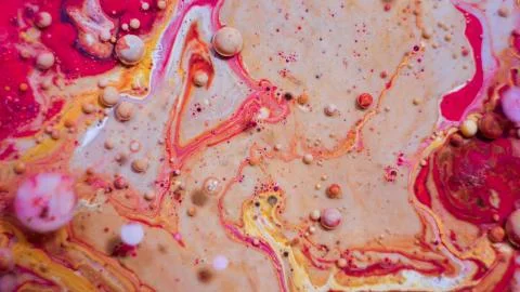 Bright colorful red bubbles on the surface of the water. Abstract paint bubbl Illustrazione stock