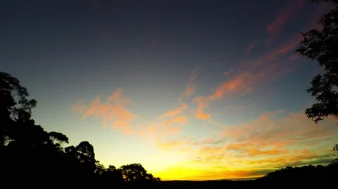 Bright Colorful Sunset with Drifting Clouds  Stock Footage 65371888