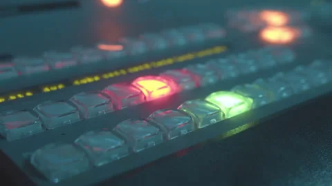 Bright colours emanate from buttons on equalizer console Stock Footage 273613081