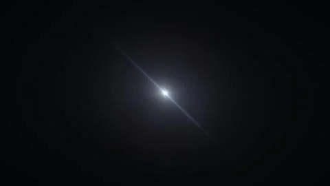 Bright comet streaking across dark night sky with starry background Stock Footage 345448302