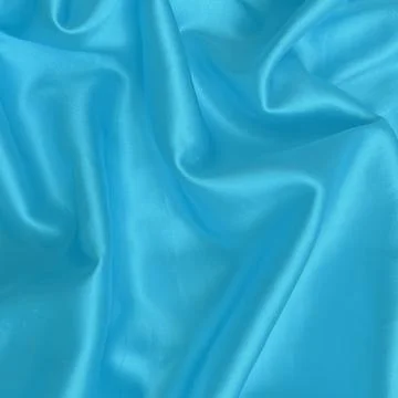 Bright Cyan Silk Fabric Texture Background with Soft Folds 写真素材