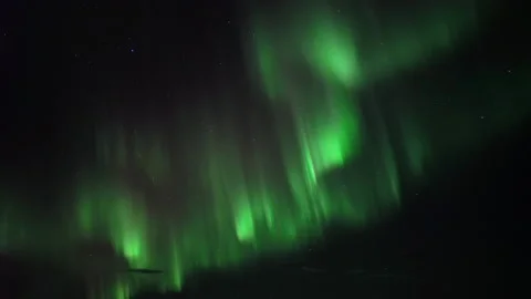 Bright dancing aurora borealis real-time video Stock Footage 165784364