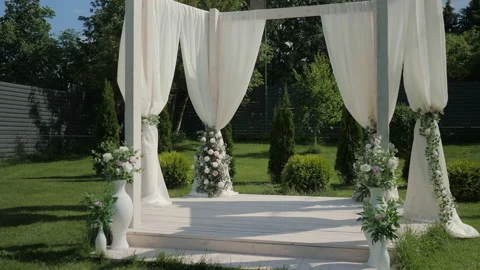 Bright decor and chairs for the wedding ceremony. Arch for wedding ceremony Stock Footage 236200980