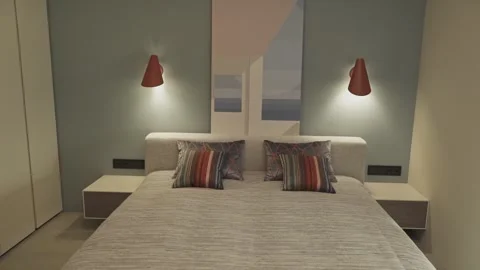 Bright decorative pillows on the bed Stock Footage 275170249