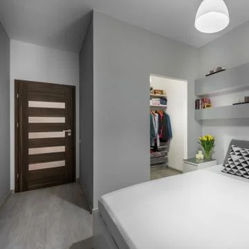 Bright designed bedroom Stock Photos