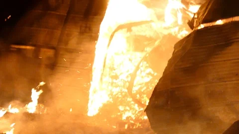 Bright devastating closeup shot of building fire that is completely destroyed Video stock 123203892