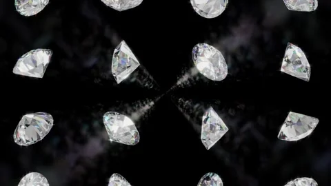Bright Diamonds Falling with Slight Rotation Against a Black Background. 4K Stock Footage 336869811