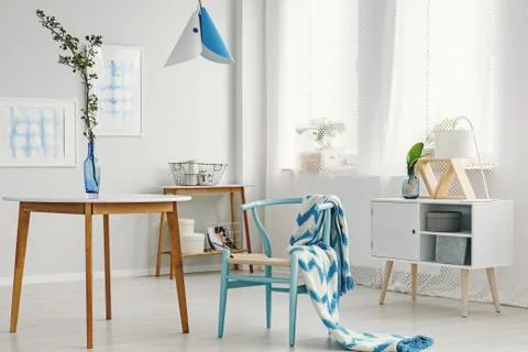 Bright dining space with twig Stock-Fotos