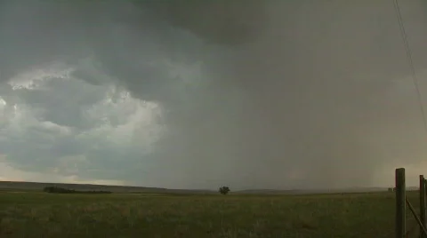 Bright double flash of lightning over farmland Stock Footage 503392