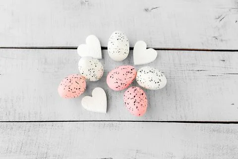 Bright easter eggs on a blue plain surface, easter decor Stock Photos
