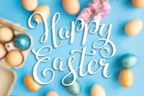 Bright easter eggs with happy Easter lettering, holiday concept. Selective focus Stock Illustration