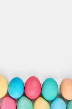 Bright Easter eggs on white background. Stock Photos