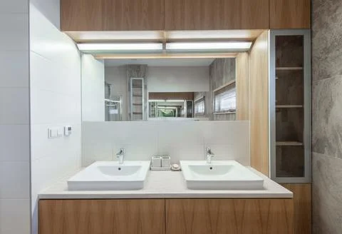 Bright Elegant Modern Bathroom Interior Design of White Sink, Mirror, Heate.. Stock Photos