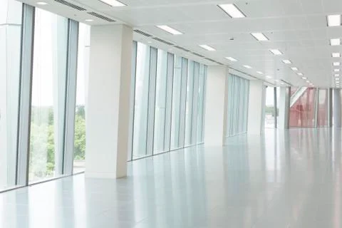 Bright Empty Office Interior and Glass Panel Walls Stock Photos