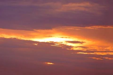 The bright evening clouds dark and the last light . Stock Photos