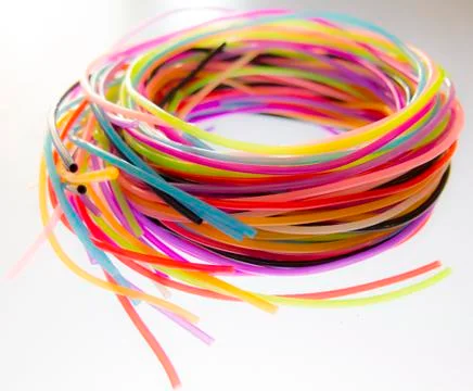 Bright ewes thread, wire rolled into a coil Stock Photos