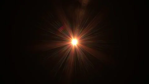 Bright Explosion of Light with Radiant Streaks Against Dark Stock Footage 338301768