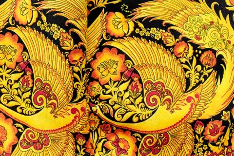 Bright fabric with ethnic Russian pattern in the form of birds and flowers. Foto stock