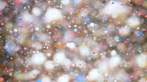 Bright Festive Background. Chaotic Motion Particles. Colorful Bubbles Oil Bea Stock Footage 119951812