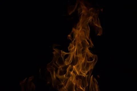 Bright fire on a black background at night Stock Photos