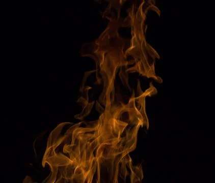 Bright fire on a black background at night Stock Photos