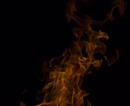 Bright fire on a black background at night Stock Photos