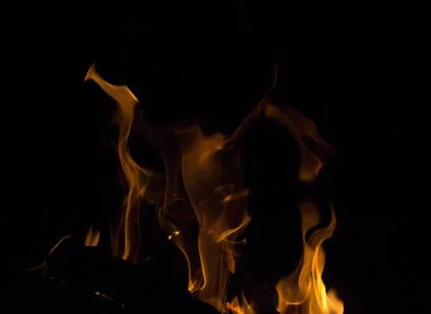 Bright fire on a black background at night Stock-Fotos