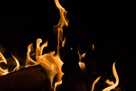 Bright fire on a black background at night Foto stock