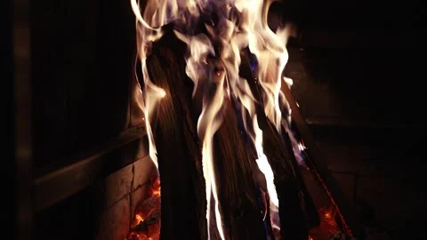 Bright fire burning in a brick oven transitions to black darkness. Stock Footage 273004479