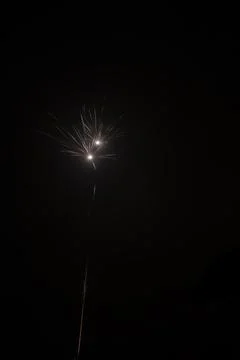 Bright firework in the night sky Stock Photos