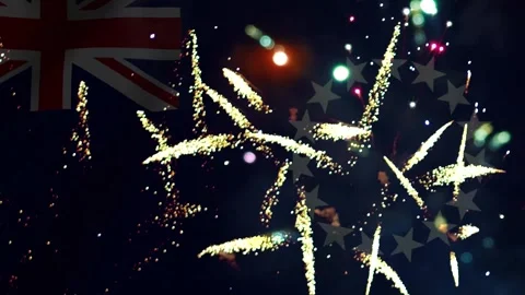 Bright fireworks display over the flag of the Cook Islands at night Vídeos de archivo 343690592