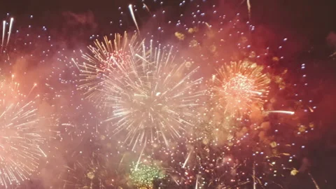 Bright fireworks exploding in night sky Stock Footage 325627056