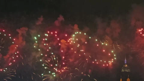 Bright fireworks exploding in night sky Stock Footage 326165920