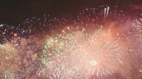 Bright fireworks exploding in night sky Stock Footage 326189596
